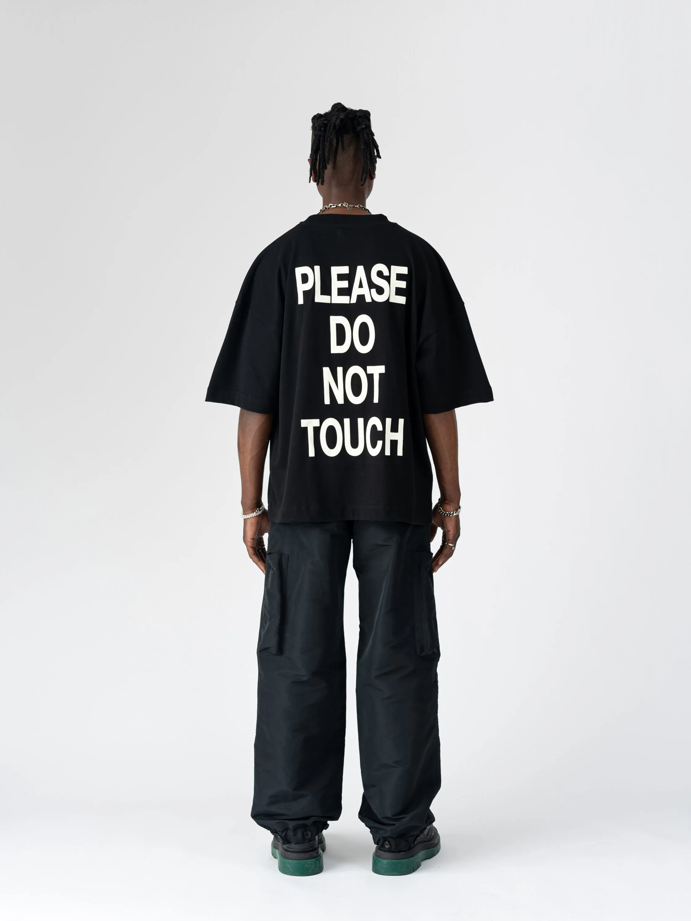 DNS006 'PLEASE DO NOT TOUCH' T-SHIRT IN BLACK